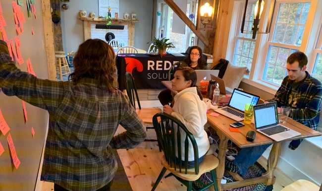 The Redfin team rebuilds the website to reflect the new brand.