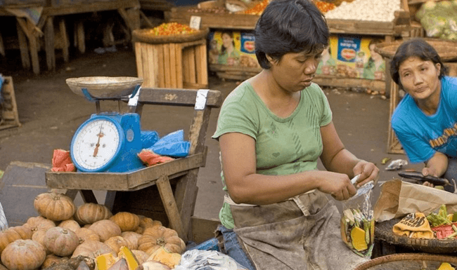 Two women in food market